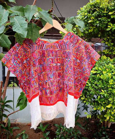 Red and white San Juan Cotzal huipil