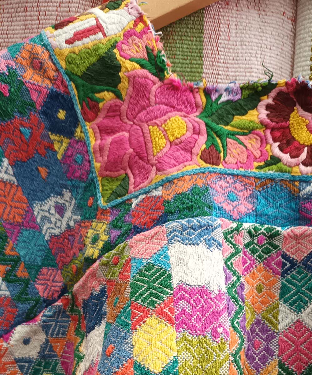 Colourful Coban huipil with floral feature