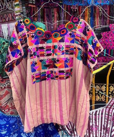 Colorful Chichi huipil with silk embroidery