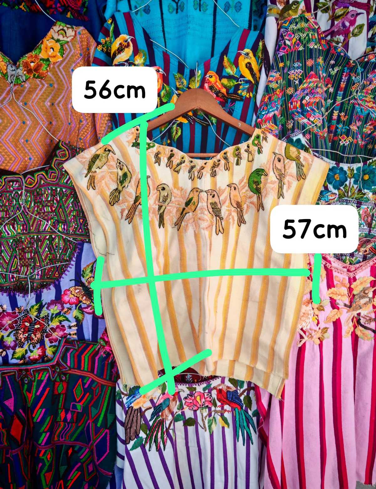 Santiago huipil and Nebaj huipil (reserved for Ofelia)