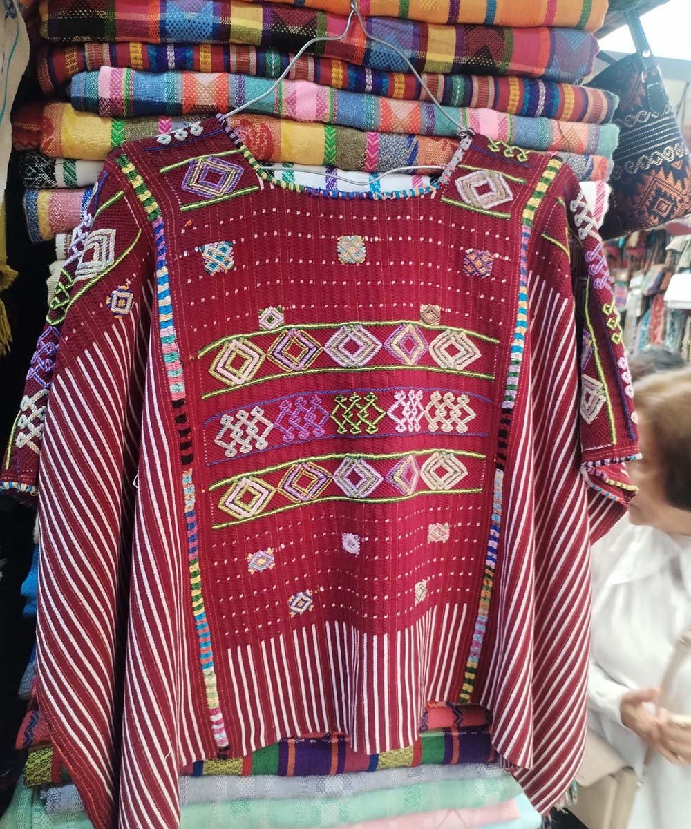 Red Colotenango huipil with colourful neckline