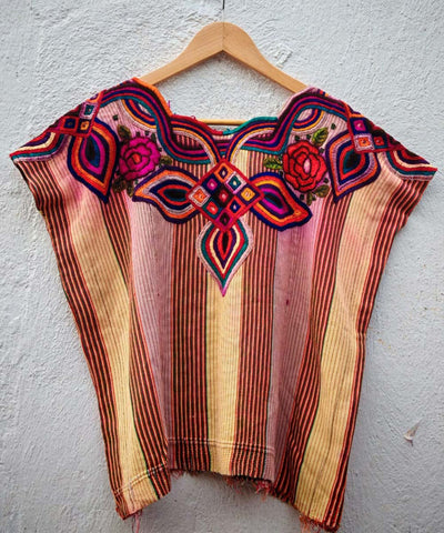 Pink and primrose huipil with bold neckline