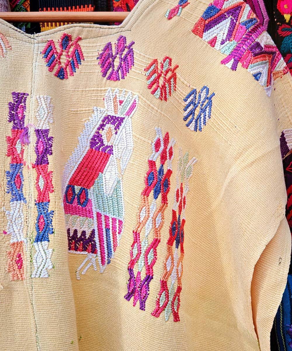 Guatemalan huipil from Chajul in yellow with bird motifs