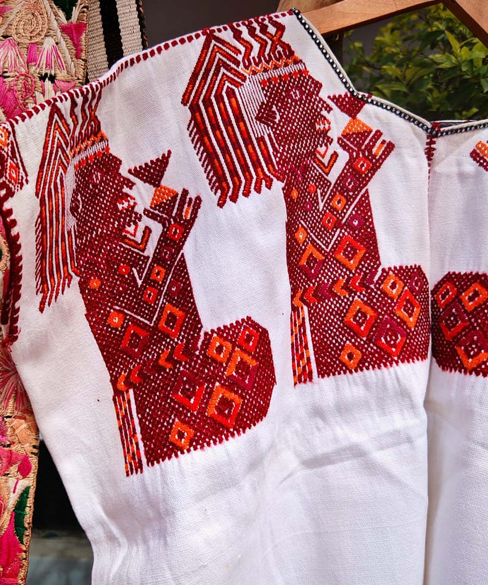 Guatemalan huipil with ceremonial men