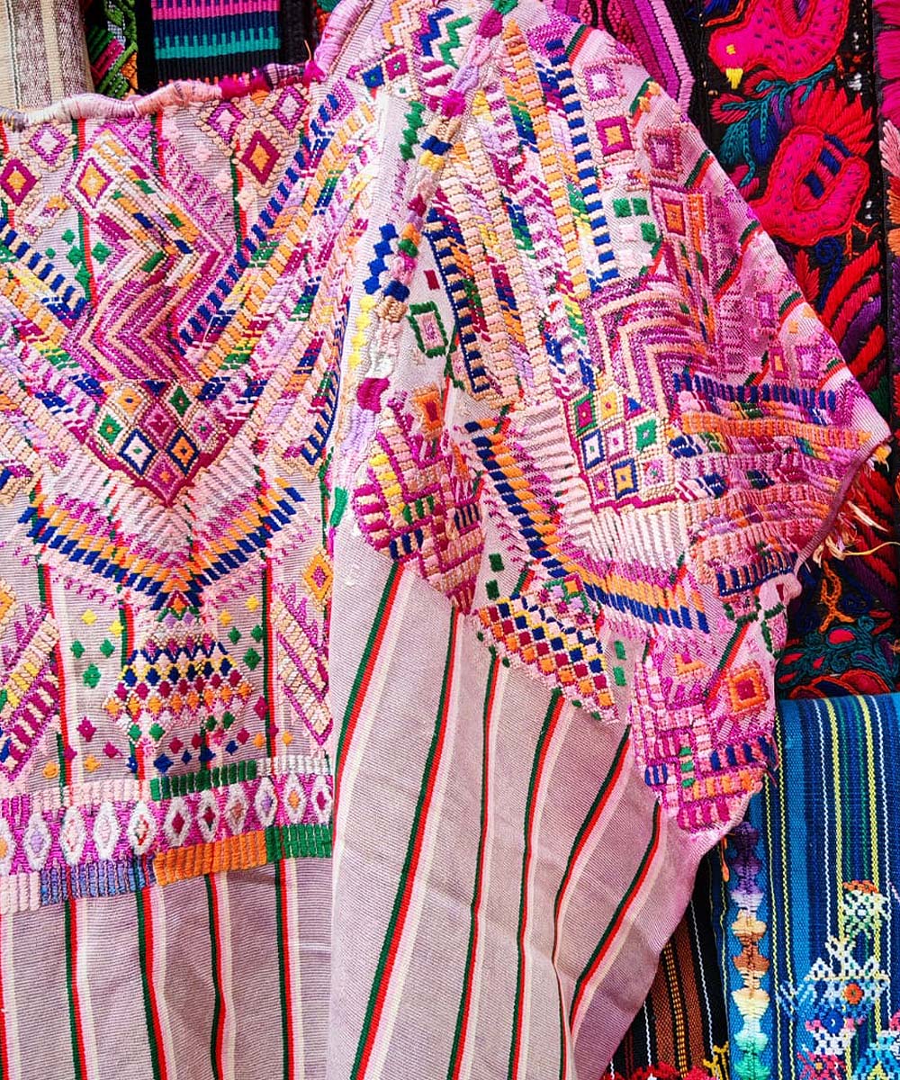 Striped Guatemalan huipil from Chichi in pink