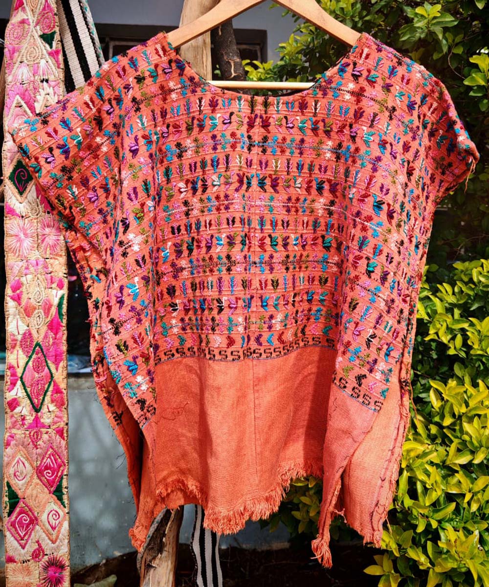 Guatemalan huipil from San Lucas in bright coral