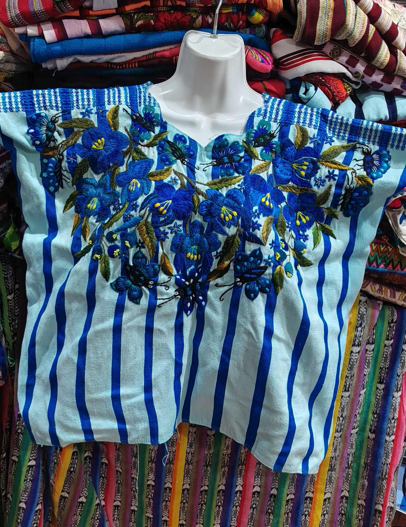 Light Blue with flowers and butterflies Santiago Huipil #8-270