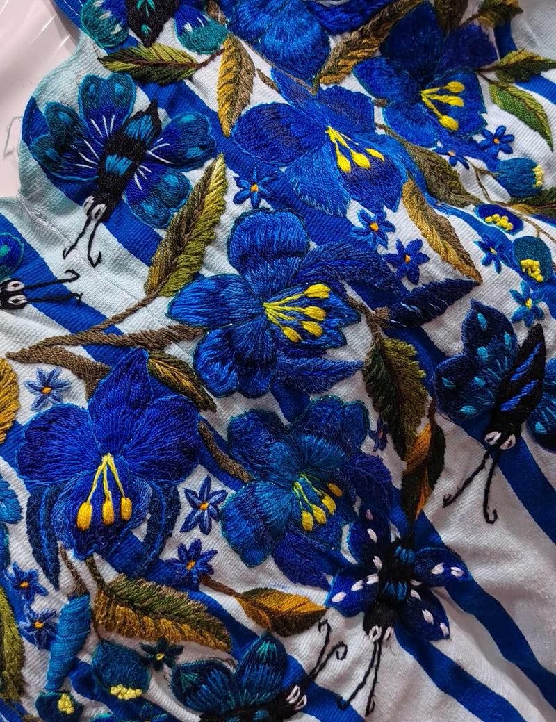 Light Blue with flowers and butterflies Santiago Huipil #8-270