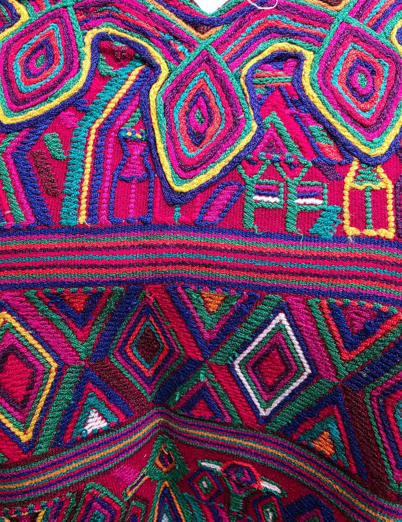 White background with red and multicolor Nebaj Huipil #8-336