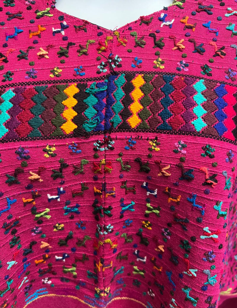 Pink background with animal embroidery in multicolor San Lucas Tolimán Huipil #8-339
