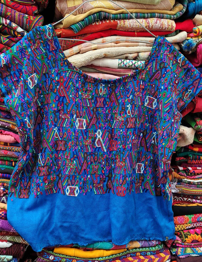 Bright blue with animals Nebaj Huipil #8-403