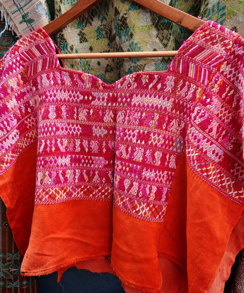 Bright red San Juan Cotzal huipil