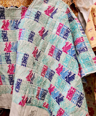Blue and red Coban huipil