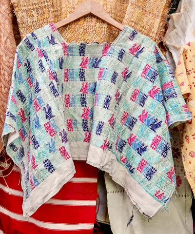 Blue and red Coban huipil