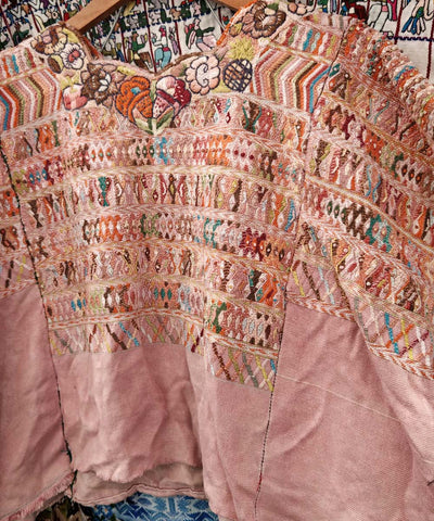 Pale pink San Juan Cotzal huipil