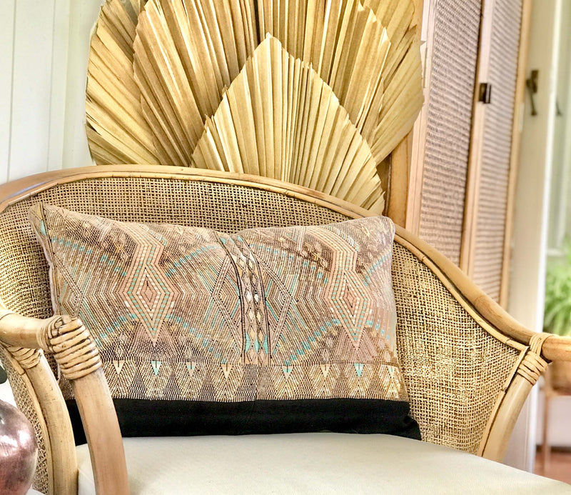 Embroidered Guatemalan huipil textile repurposed into a pillow