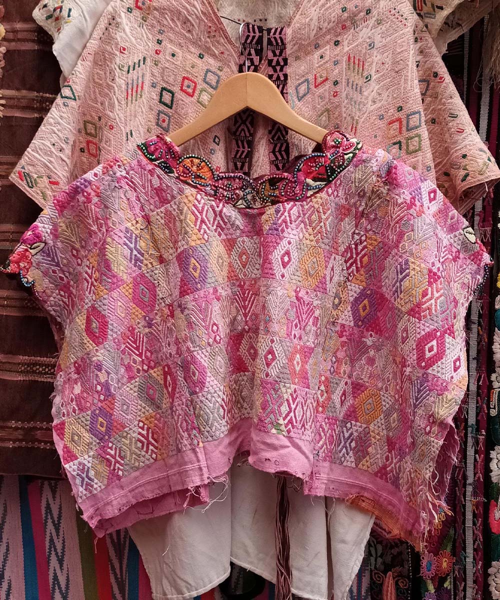 Pink Coban huipil with floral neckline