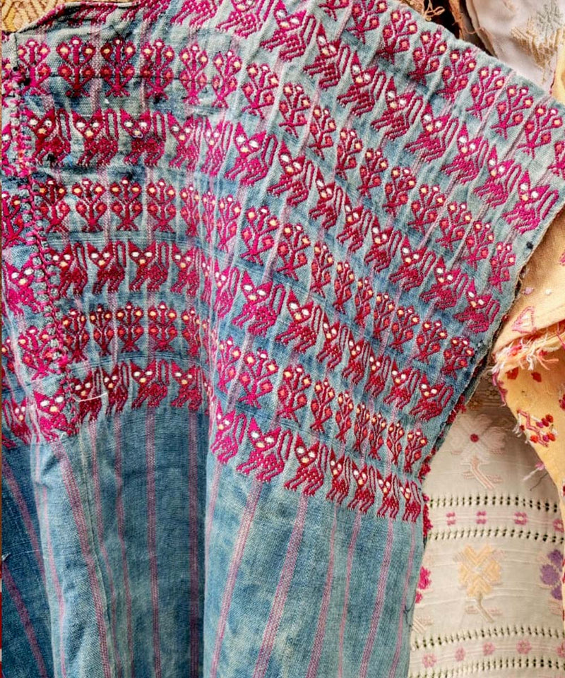 Faded indigo Nahuala huipil with pink cats