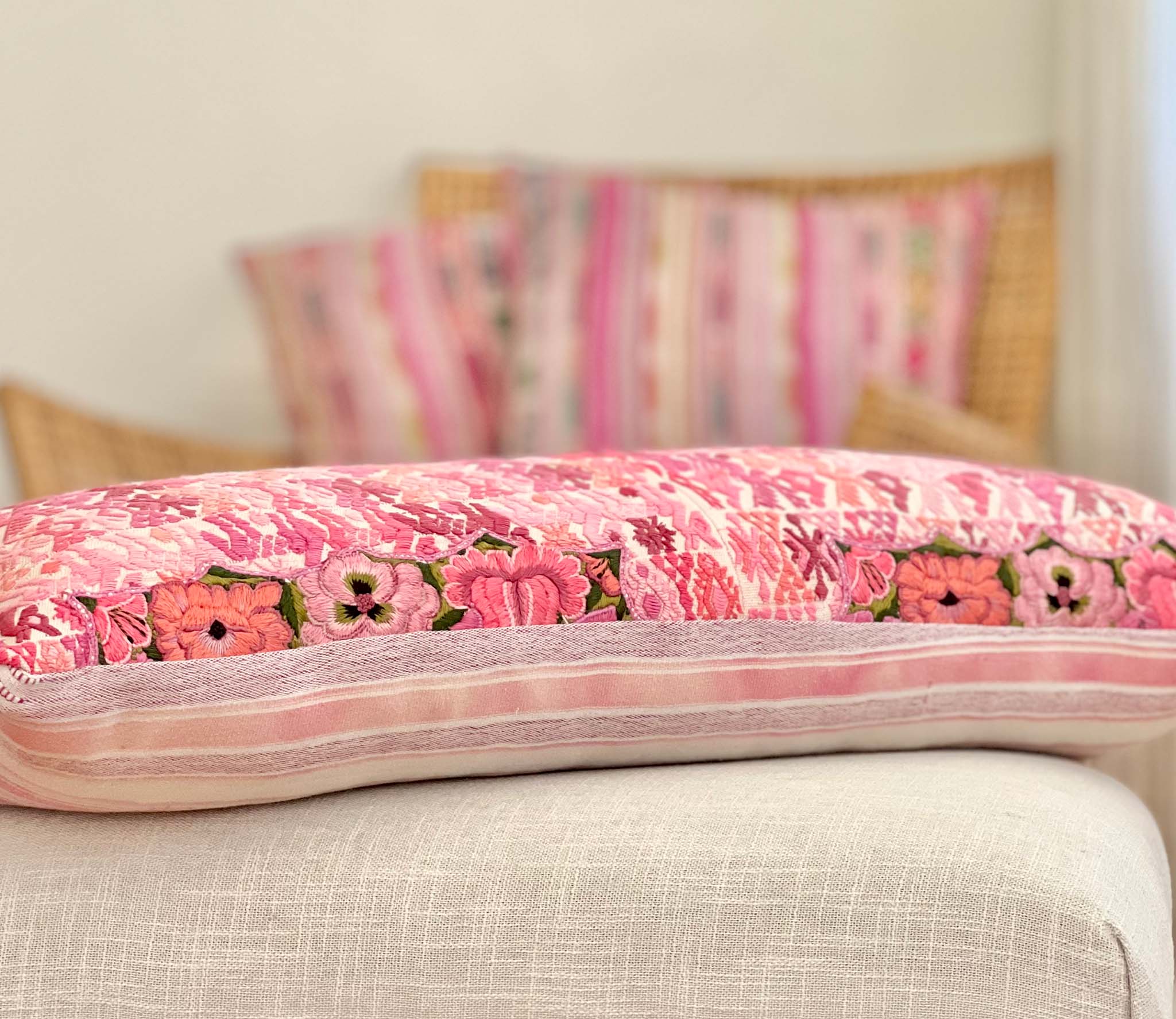 Pink Coban lumbar pillow with flowers