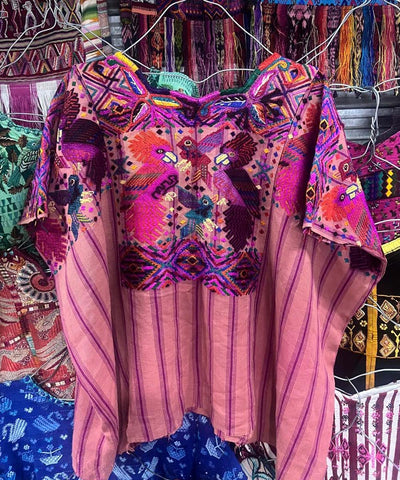 Chichi huipil with silk embroidered parrots