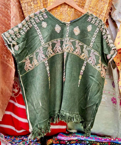 Green huipil with Quetzales