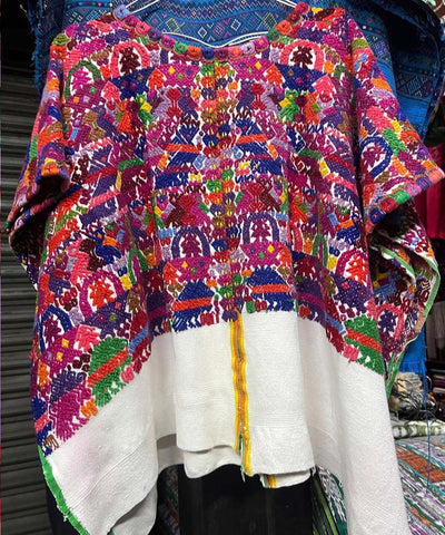 Red and purple Sacatepequez huipil