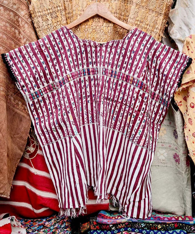 Red and white San Lucas huipil