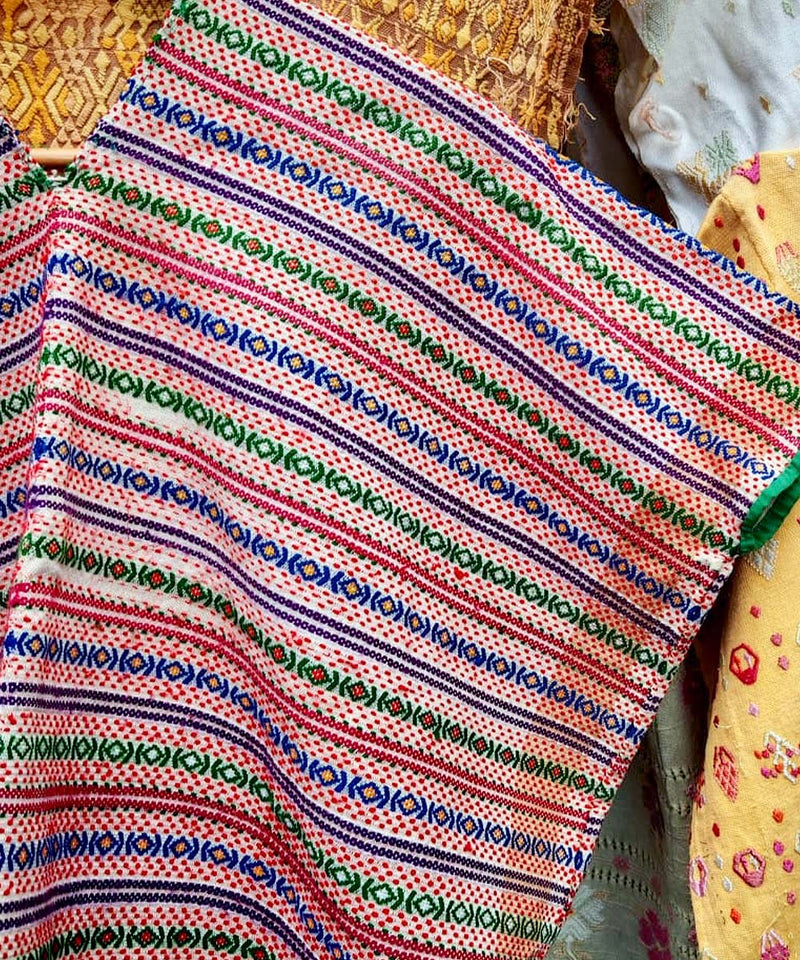 Huipil with stripes and circles