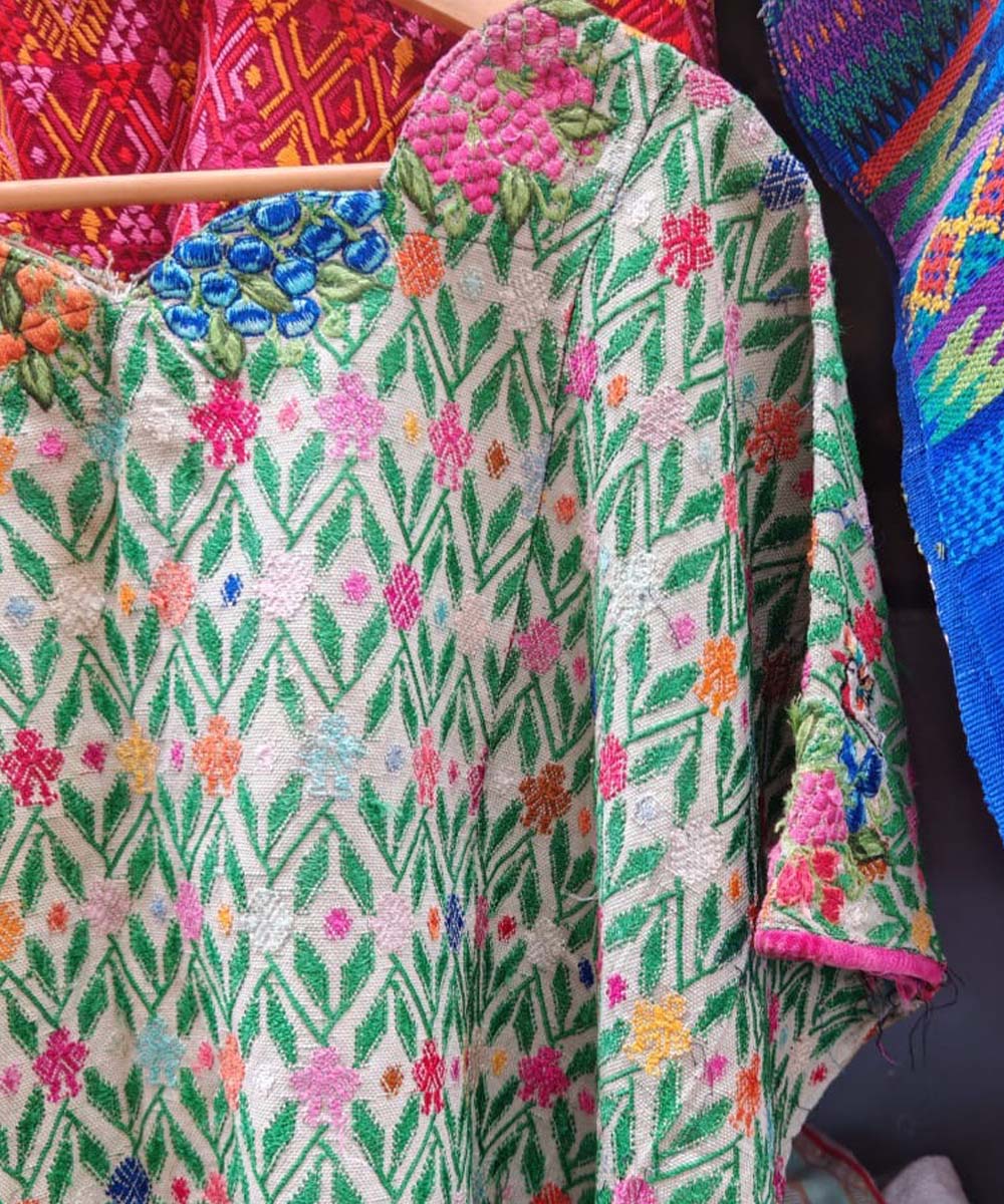 Guatemalan huipil in green and pink