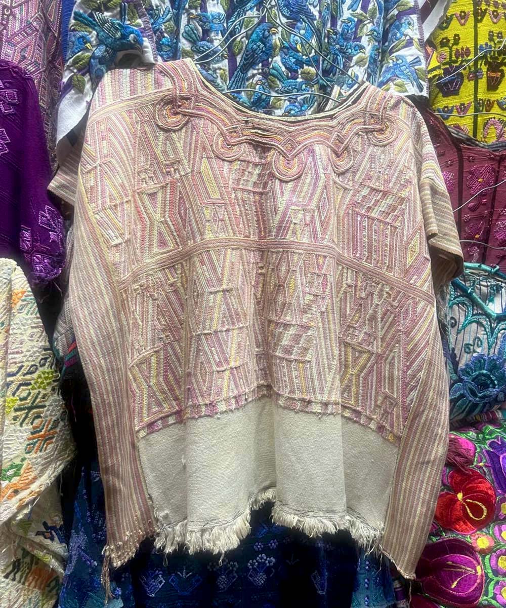 Pink and white Nebaj huipil