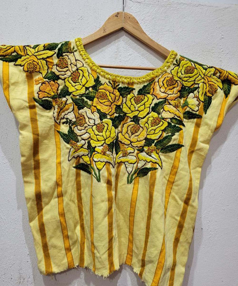 Yellow Santiago huipil with flowers