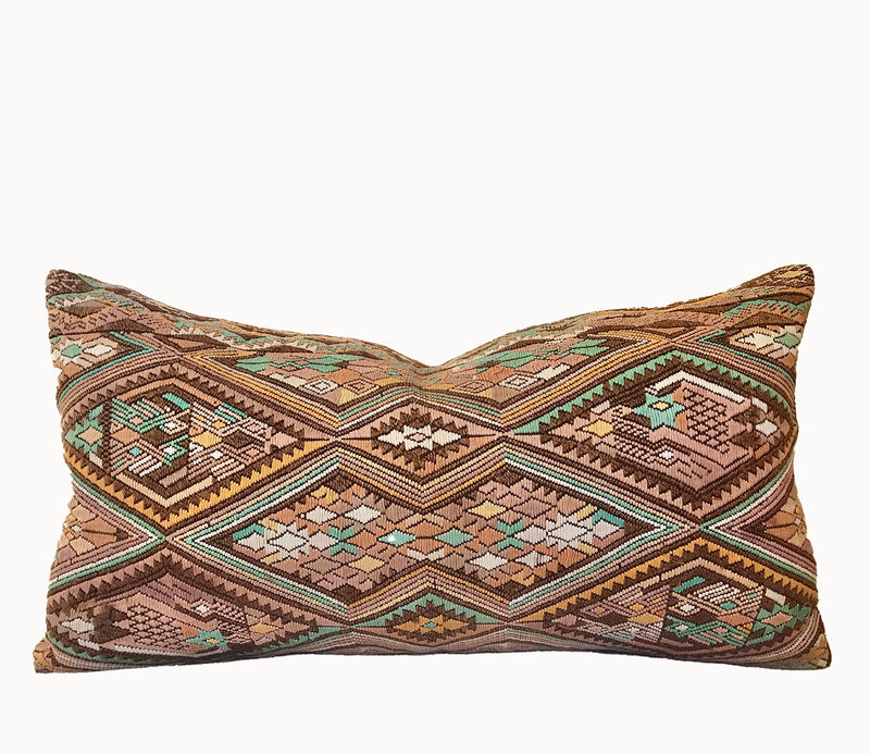 Embroidered Guatemalan huipil textile repurposed into a pillow