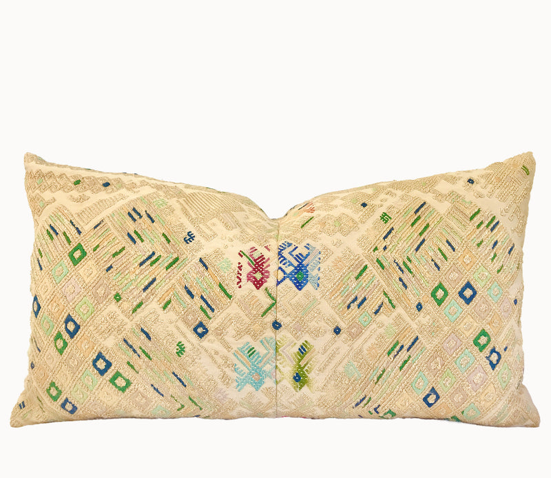 Guatemalan embroidered huipil pillow. Geometric chevron design in bold fuchsia 