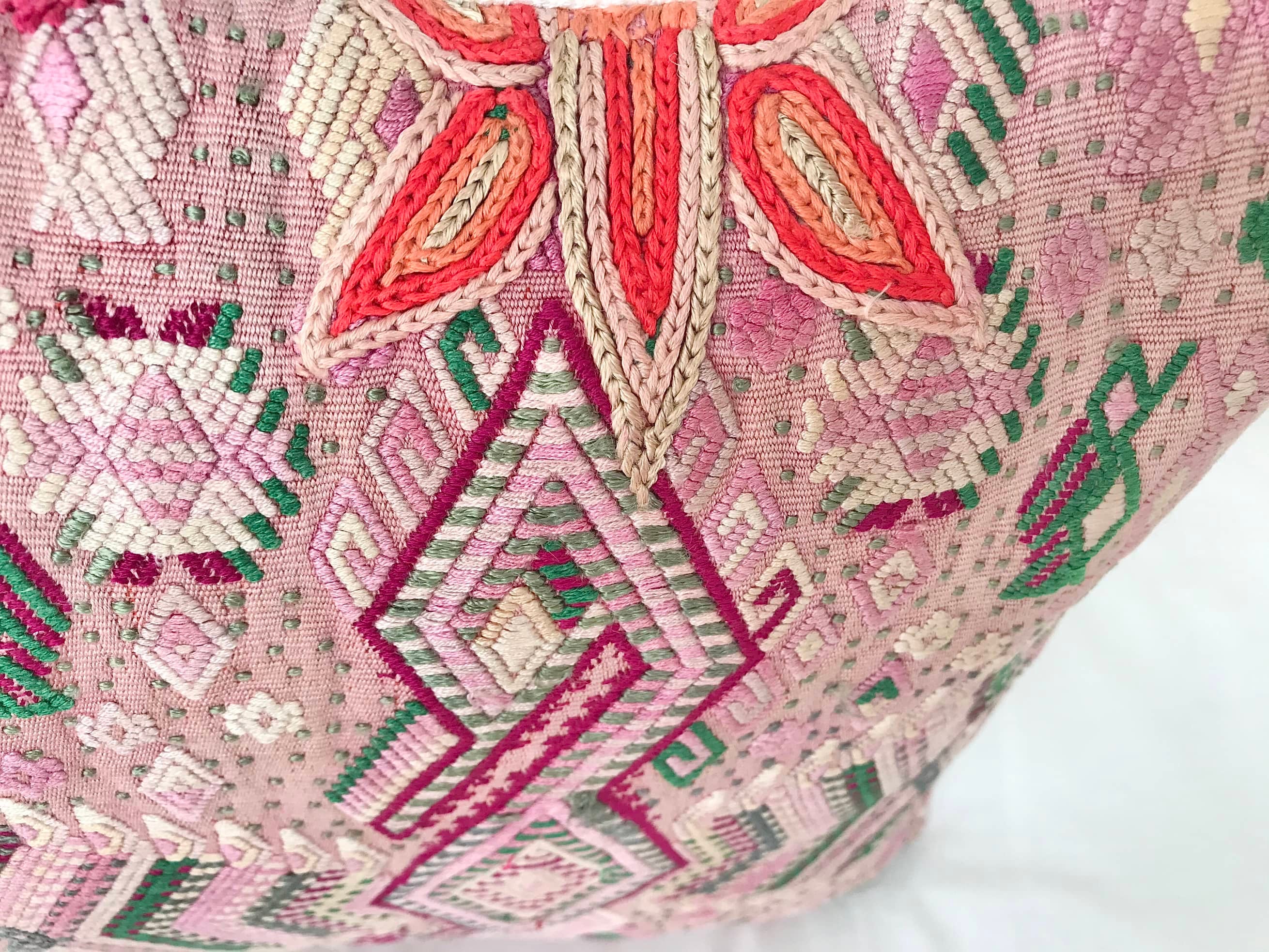 Guatemalan Huipil Pillow, vintage, hand embroidered textile of stylised birds in pink and green in a shabby chic design