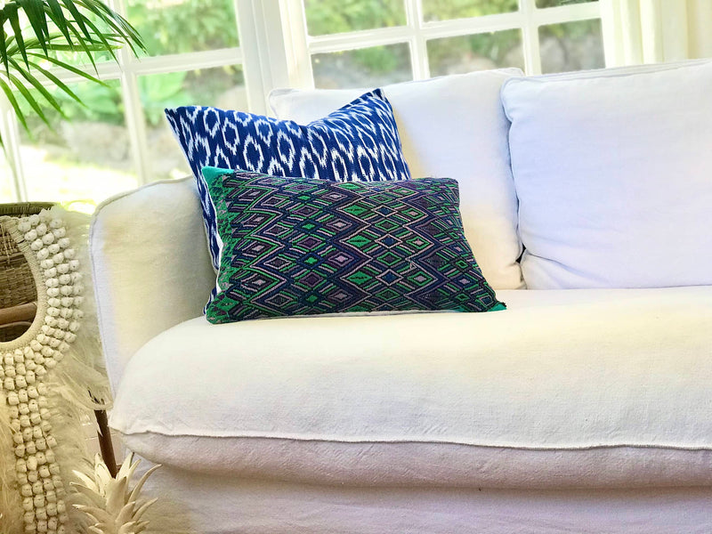 Guatemalan embroidered huipil pillow. Geometric pattern in bold tropical colours for bohemian decor