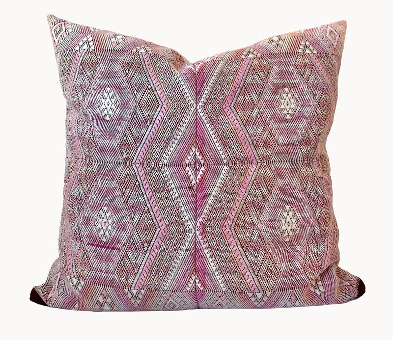 Guatemalan embroidered huipil pillow. Chevron pattern in a pale pink palette.