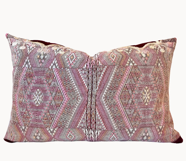Guatemalan embroidered huipil pillow. Geometric chevron pattern in a pale pink palette.