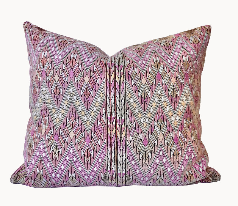 Guatemalan embroidered huipil pillow. Geometric chevron pattern in a pale pink palette.