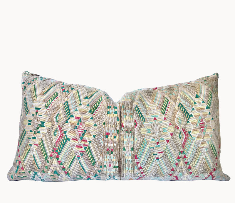 Guatemalan embroidered huipil pillow. Geometric chevron pattern in beige.
