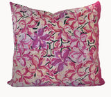 Guatemalan embroidered huipil pillow. A fuchsia vintage textile with an abstract floral design.