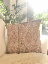 Guatemalan embroidered huipil pillow. Geometric chevron pattern in a pale pink palette for boho decor.