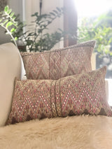 Guatemalan embroidered huipil pillow. Geometric chevron pattern in a pale pink palette for boho decor.