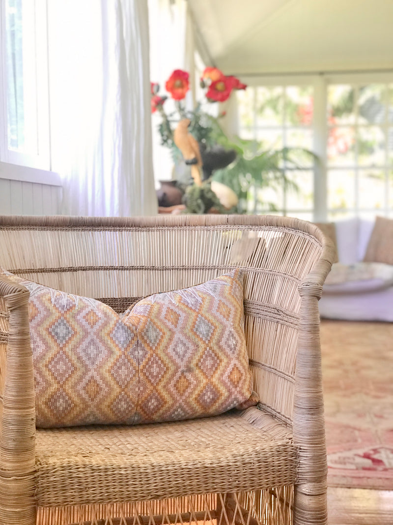 Vintage textile pillows made from a Guatemalan huipil and corte