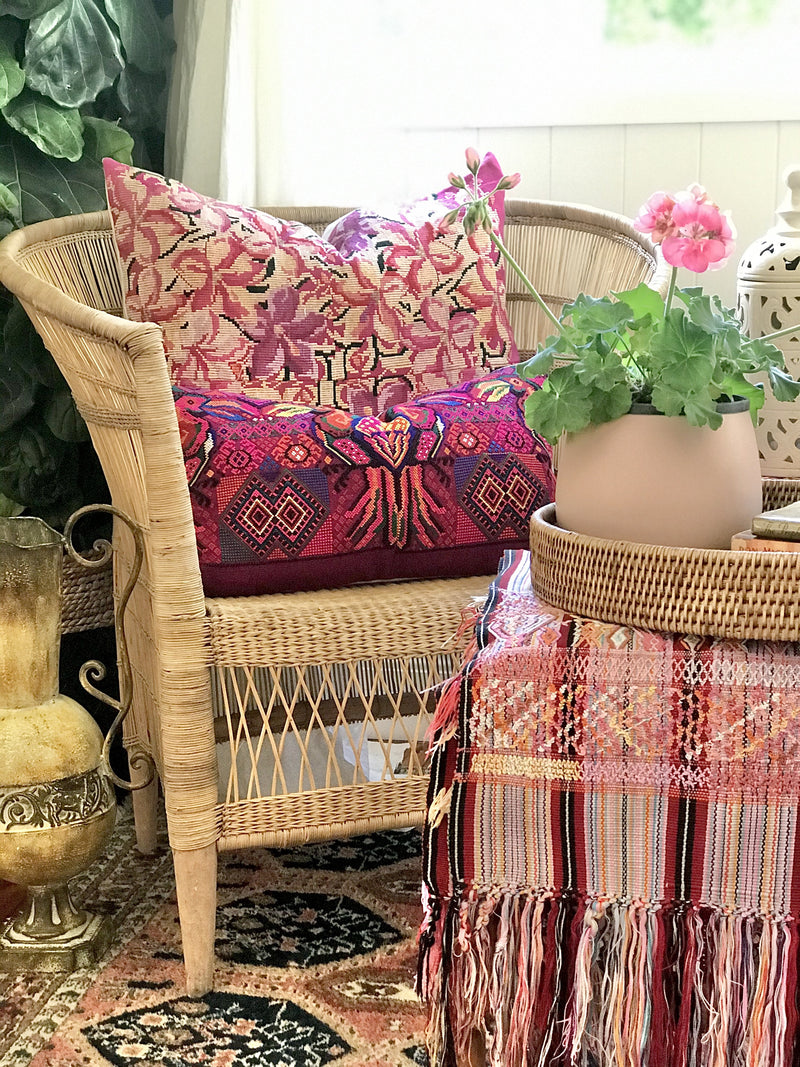 Guatemalan embroidered huipil pillow. A fuchsia vintage textile with colourful kissing Toucans bird design.