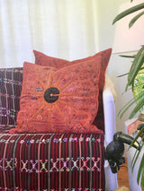 Guatemalan Huipil Textile Pillow, vintage, hand embroidered orange Nahuala huipil with a black sun in the centre