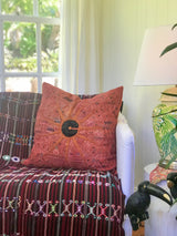 Guatemalan Huipil Textile Pillow, vintage, hand embroidered orange Nahuala huipil with a black sun in the centre