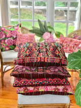 Bright pink vintage textile cushions