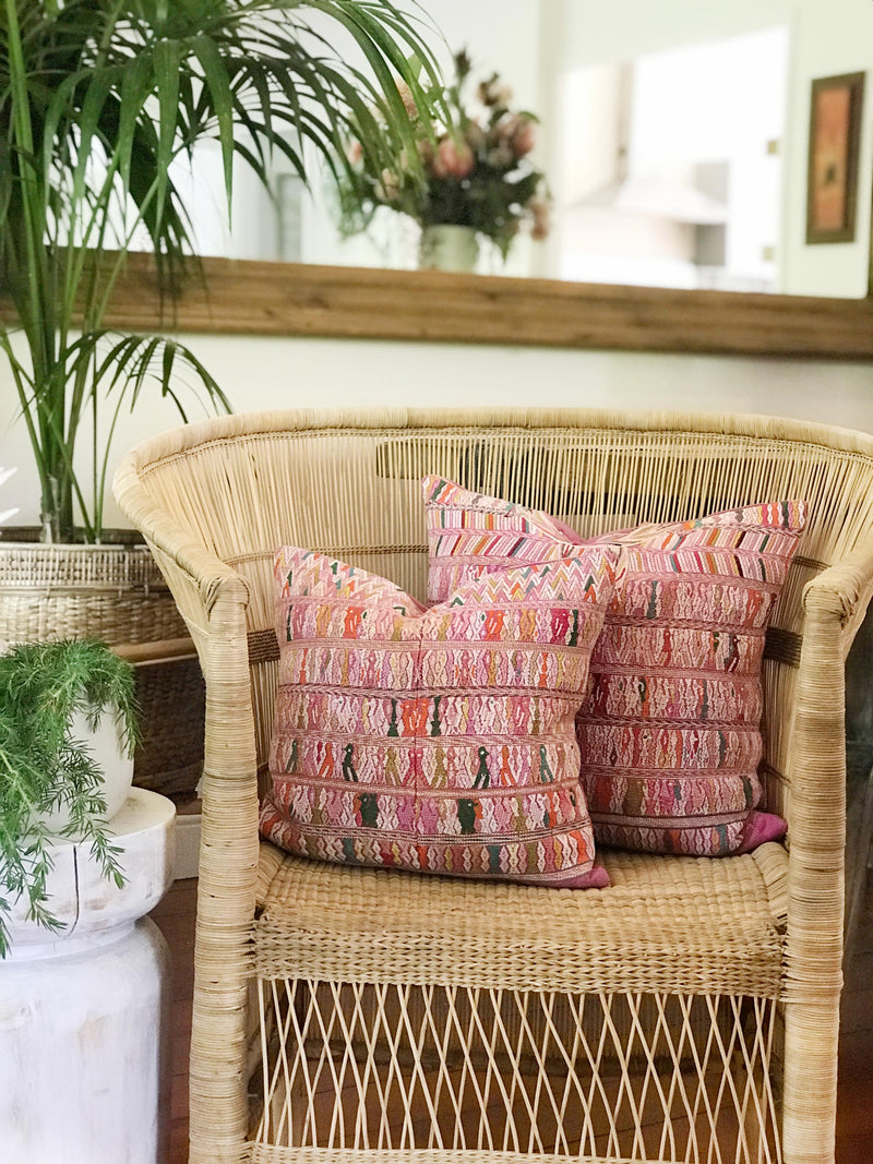 Vintage textile cushions made from a Guatemalan huipil and corte.