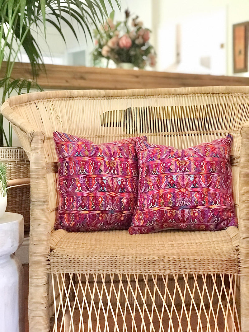 Vintage textile pillows made from a Guatemalan huipil and corte.