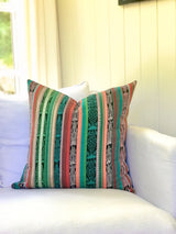 Vintage textile cushion made from a Guatemalan huipil and corte